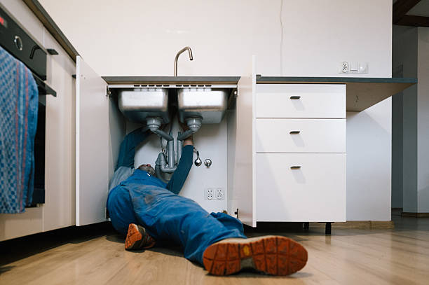Professional Emergency Plumber technician working in Dartmouth, MA
